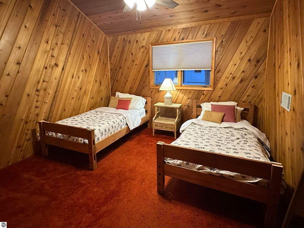 Image 21 of property listing at 7780 Elk Tip Drive, Rapid City, MI 49676