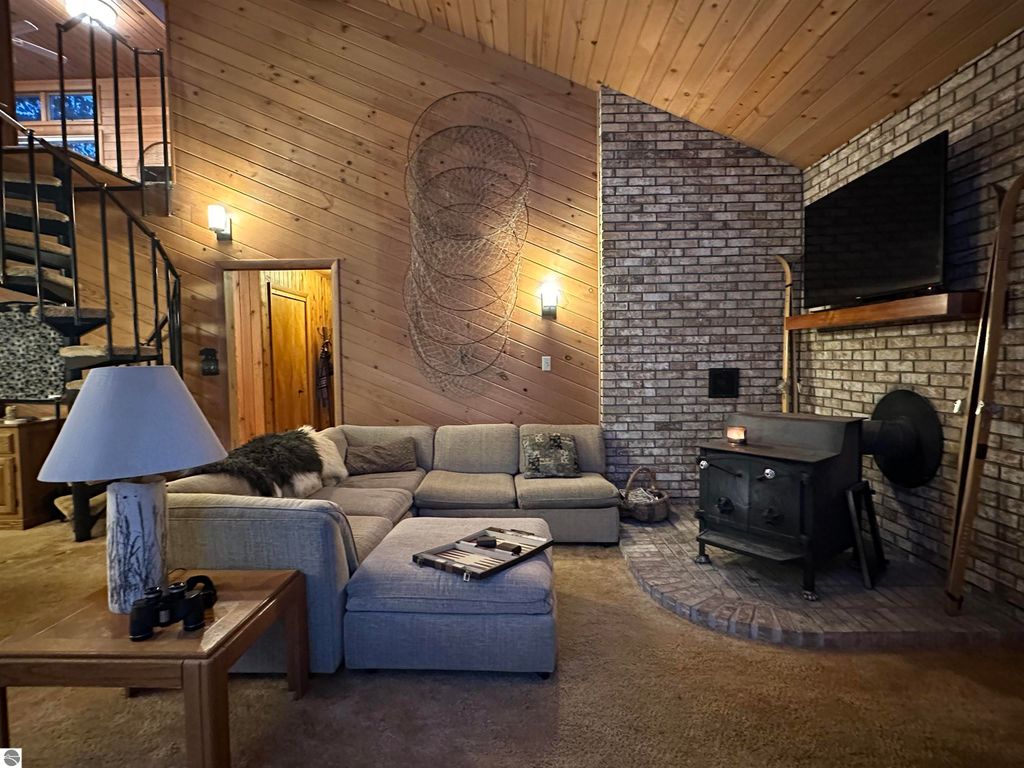 Image 4 of property listing at 7780 Elk Tip Drive, Rapid City, MI 49676