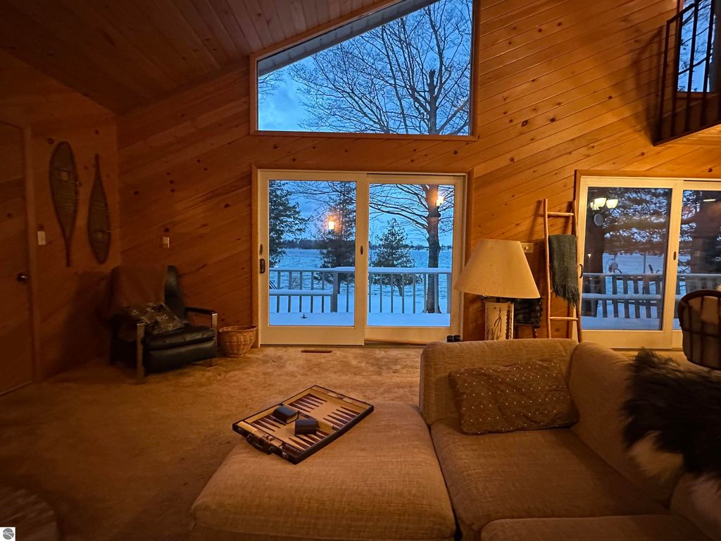 Image 6 of property listing at 7780 Elk Tip Drive, Rapid City, MI 49676