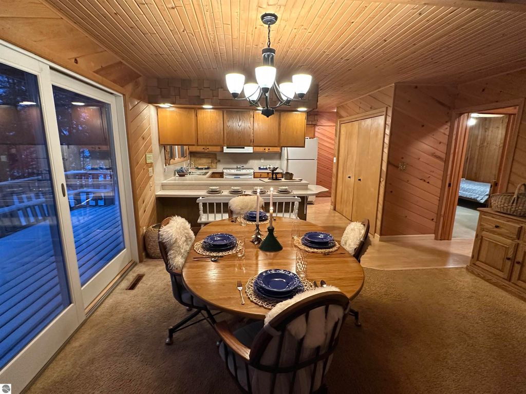 Image 8 of property listing at 7780 Elk Tip Drive, Rapid City, MI 49676