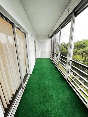 6289 Lear Drive 302, Atlantis, FL 33462