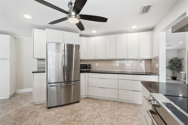 418 AVALON DRIVE, Cape Coral, FL 33904