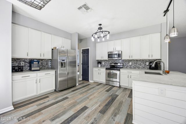 1441 LAUREL OAK Drive, Fleming Island, FL 32003