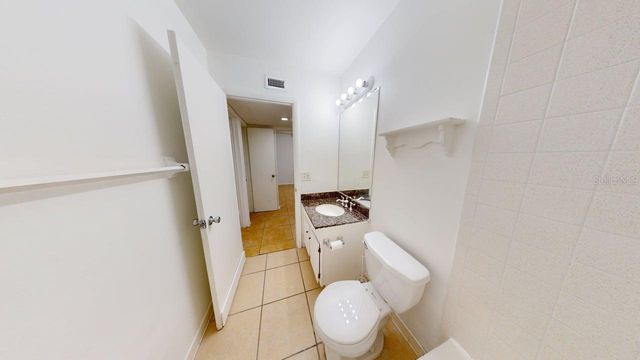 1000 LAKE OF THE WOODS BOULEVARD 203F, Casselberry, FL 32730