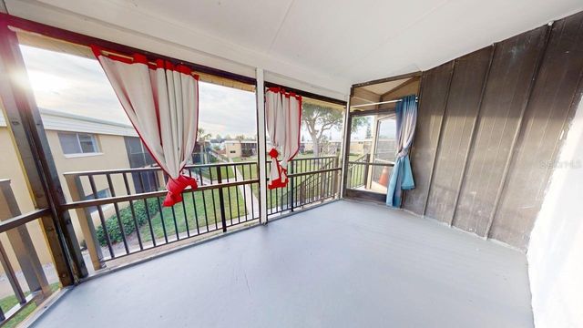 1000 LAKE OF THE WOODS BOULEVARD 203F, Casselberry, FL 32730