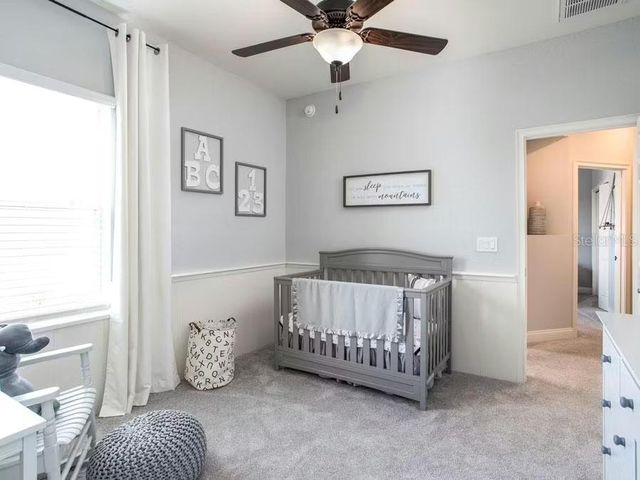 8687 WILDFLOWER FIELDS LANDING, Wildwood, FL 34785