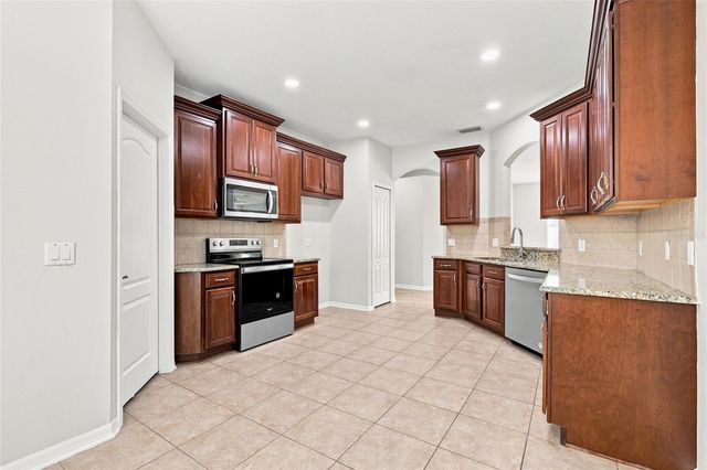 7806 GRASMERE DRIVE, Land O Lakes, FL 34637