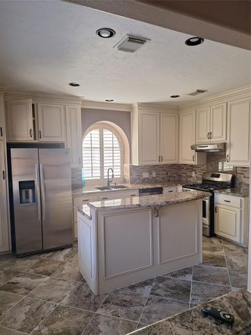 12827 Lindsey Lane, Stafford, TX 77477