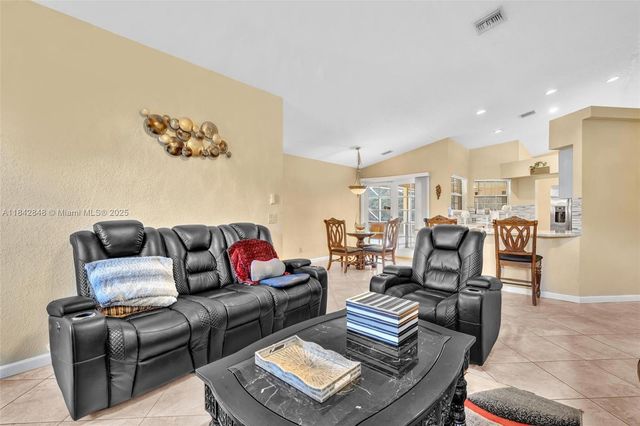 104 Oxford Ct, Royal Palm Beach, FL 33411