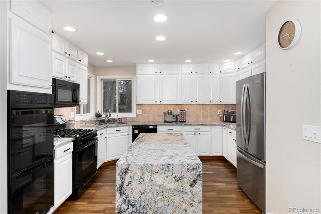 8171 S Homesteader Drive, Morrison, CO 80465