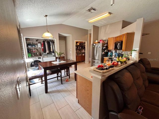 86 SECRETARY TRAIL, Palm Coast, FL 32164