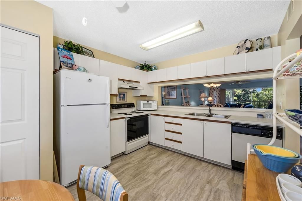 7025 Dennis CIR G202, NAPLES, FL 34104 — photo 2