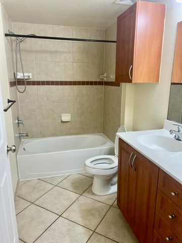6426 EMERALD DUNES Drive 206, West Palm Beach, FL 33411