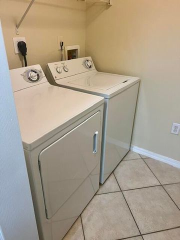 6426 EMERALD DUNES Drive 206, West Palm Beach, FL 33411