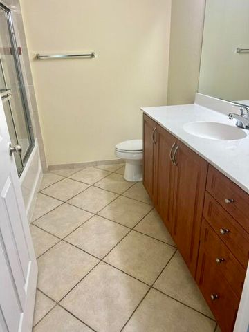 6426 EMERALD DUNES Drive 206, West Palm Beach, FL 33411