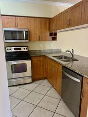 6426 EMERALD DUNES Drive 206, West Palm Beach, FL 33411