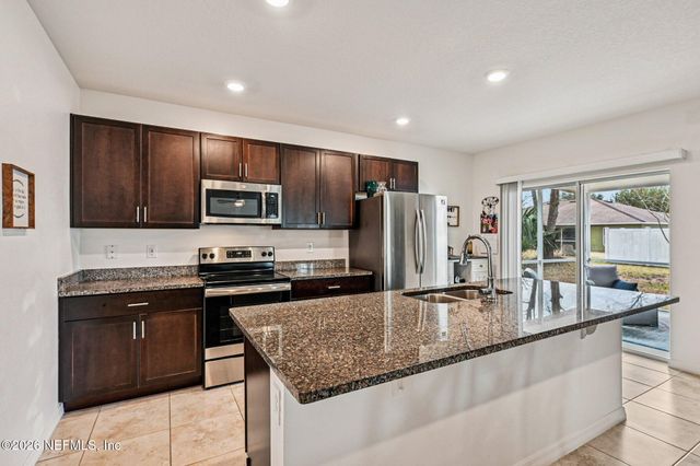 169 BIRD OF PARADISE Drive, Palm Coast, FL 32137