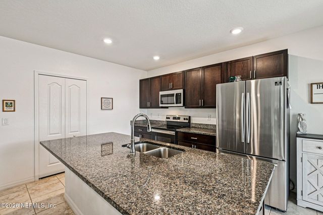 169 BIRD OF PARADISE Drive, Palm Coast, FL 32137