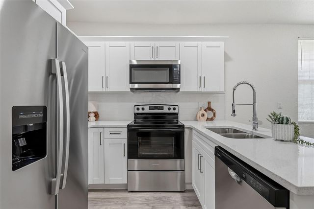 7608 N HUNTLEY AVENUE, Tampa, FL 33604