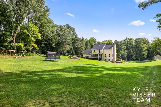 1873 Grand River Drive Ne, Ada Twp, MI 49301