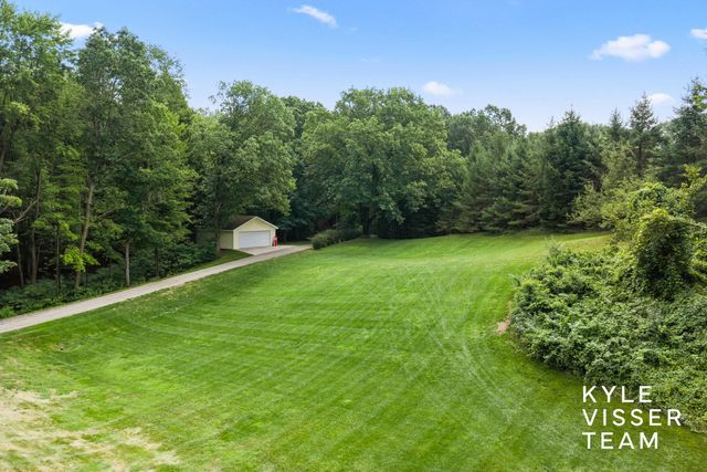 1873 Grand River Drive Ne, Ada Twp, MI 49301
