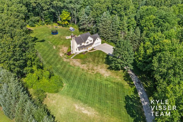 1873 Grand River Drive Ne, Ada Twp, MI 49301