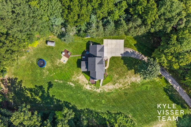 1873 Grand River Drive Ne, Ada Twp, MI 49301