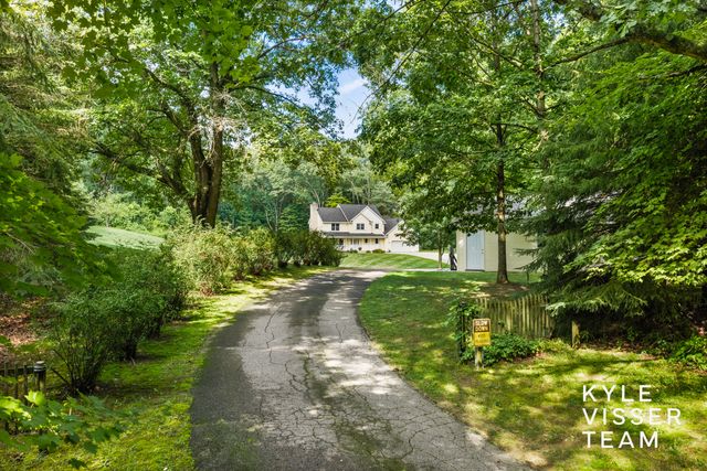 1873 Grand River Drive Ne, Ada Twp, MI 49301