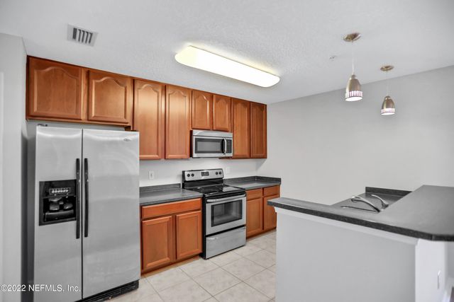 7051 DEER LODGE Circle 107, Jacksonville, FL 32256