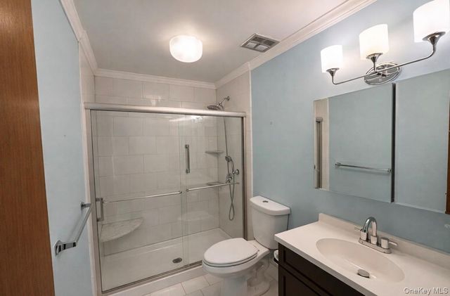 306 Torquay Court E, Ridge, NY 11961