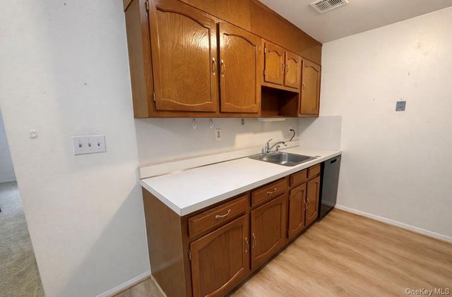 306 Torquay Court E, Ridge, NY 11961