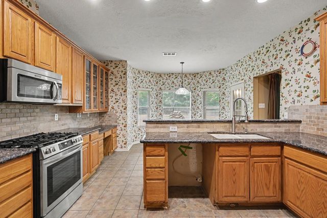 1018 Mesquite Drive, Magnolia, TX 77354