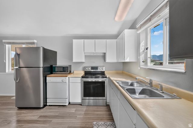 1994 W CHAMPAGNE AVE, Taylorsville, UT 84129