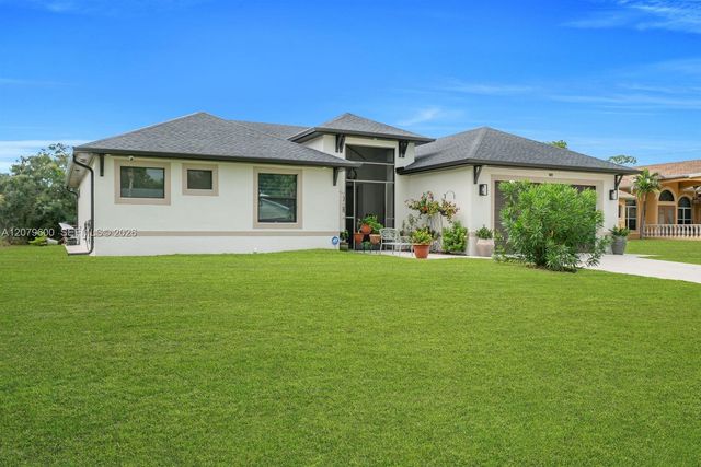 609 Clayton Avenue, Lehigh Acres, FL 33972