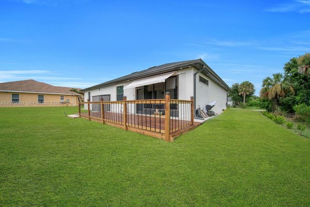 609 Clayton Avenue, Lehigh Acres, FL 33972