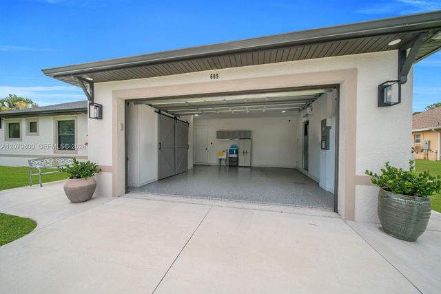 609 Clayton Avenue, Lehigh Acres, FL 33972