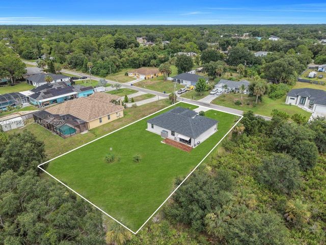609 Clayton Avenue, Lehigh Acres, FL 33972