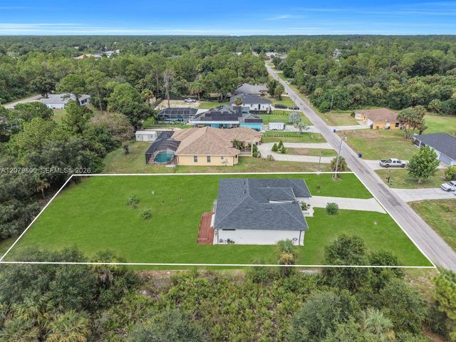 609 Clayton Avenue, Lehigh Acres, FL 33972