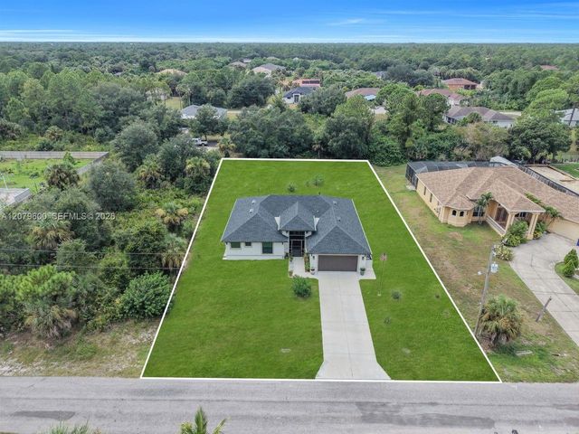 609 Clayton Avenue, Lehigh Acres, FL 33972