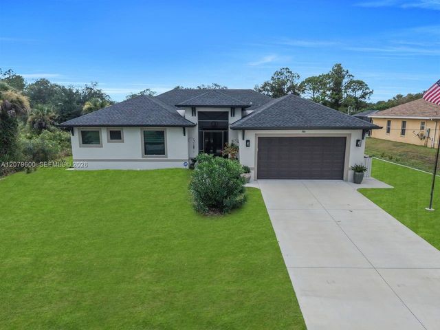 609 Clayton Avenue, Lehigh Acres, FL 33972