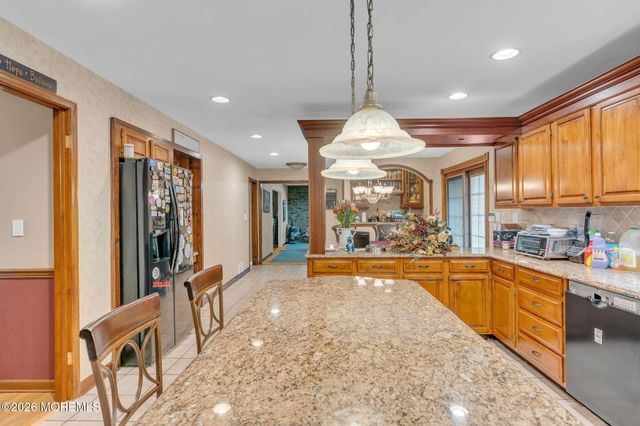 65 Devonshire Drive, Morganville, NJ 07751