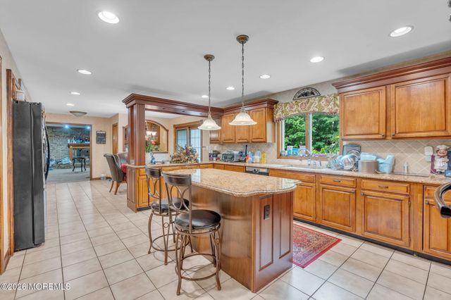 65 Devonshire Drive, Morganville, NJ 07751