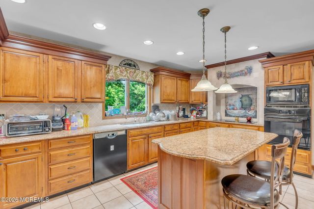 65 Devonshire Drive, Morganville, NJ 07751