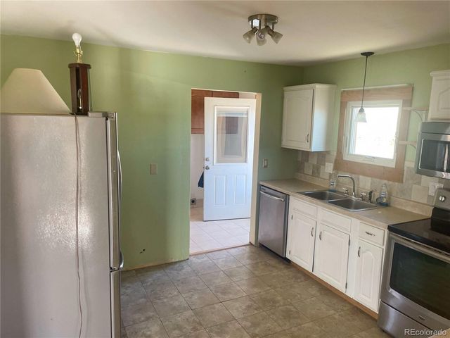 45005 E Maplewood Drive, Bennett, CO 80102