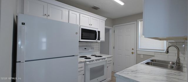 7905 PAUL JONES Drive, Jacksonville, FL 32208