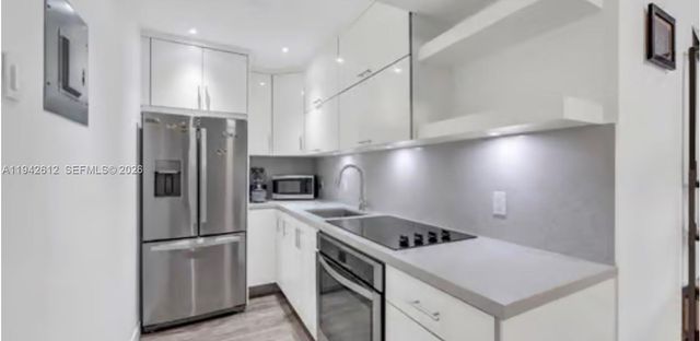 4841 NW 7th St 303-4, Miami, FL 33126