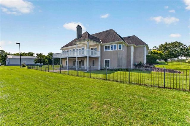 1328 E Walnut Street, Raymore, MO 64083