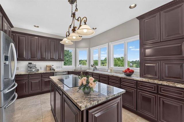 1328 E Walnut Street, Raymore, MO 64083