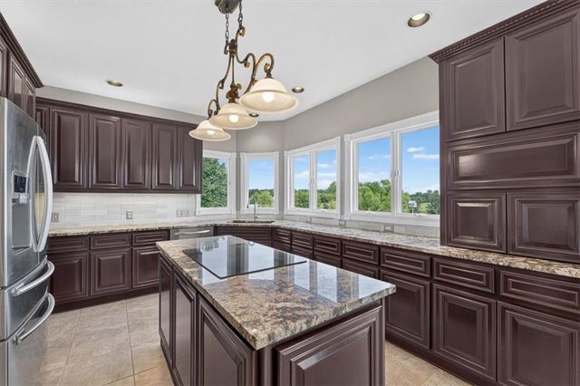 1328 E Walnut Street, Raymore, MO 64083