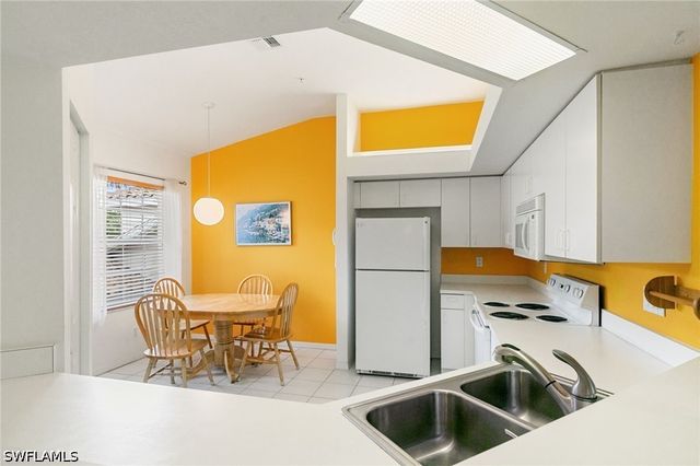 6927 Satinleaf RD N 203, Naples, FL 34109